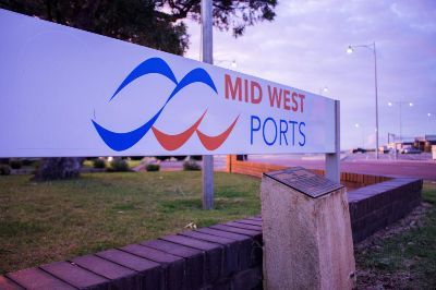 Sign with Mid West Ports logo and historical plaque.