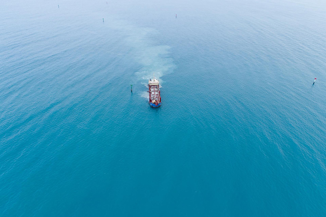 Aerial image of one ship in ocean.