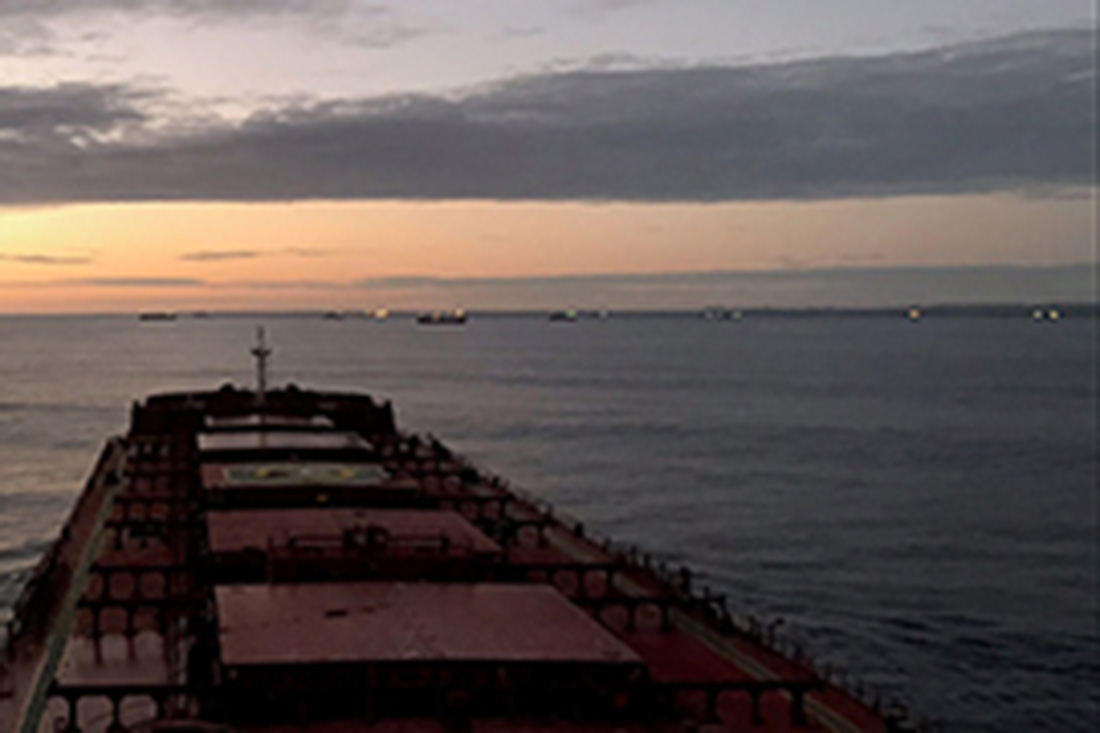 View of front half of ship as it is anchored.