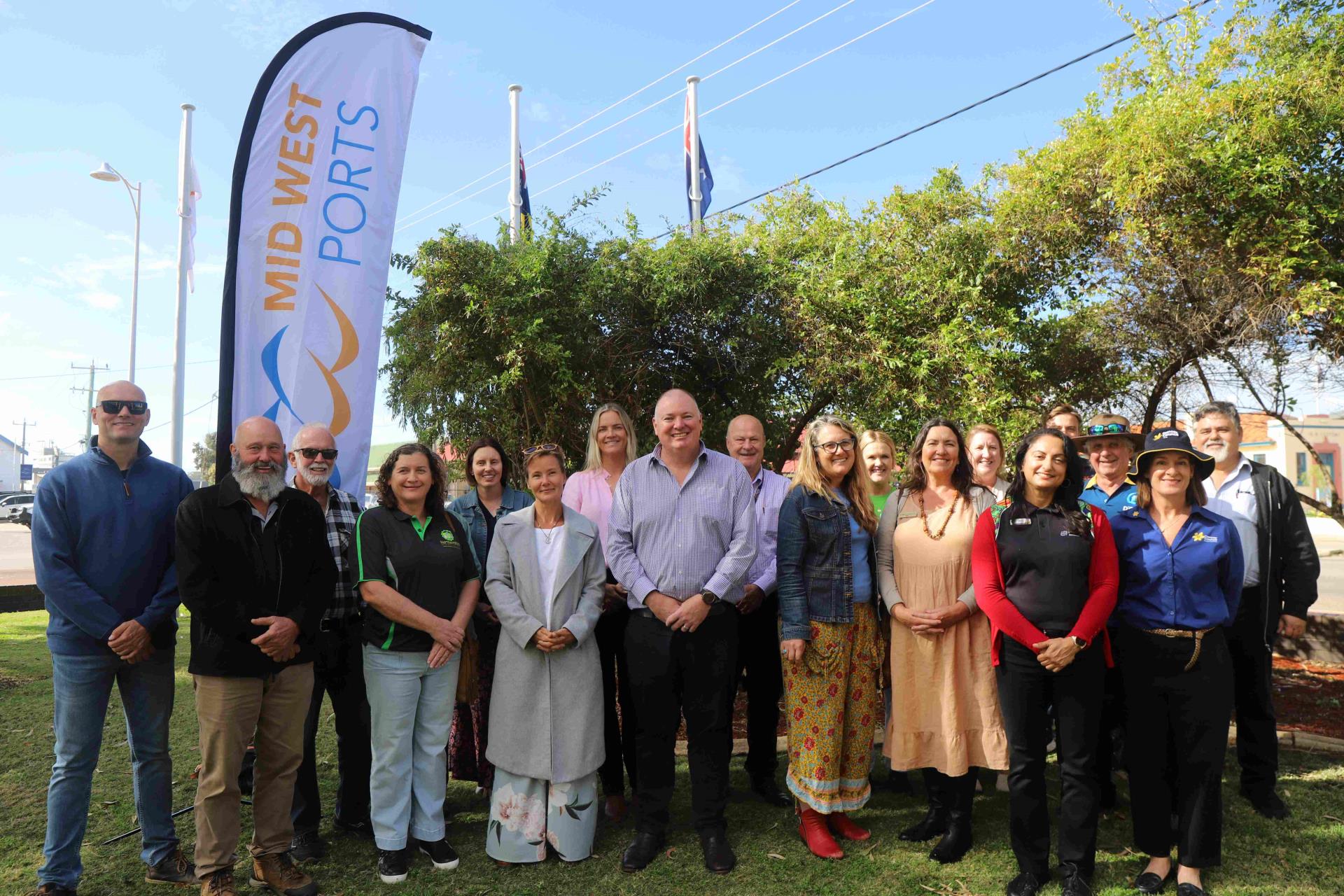 Southwestern view of port at sunrise with 5 ships, 3 tugboats and pilot boat in view.