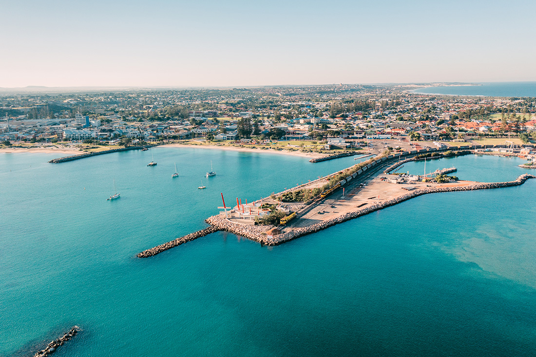 An aerial photo of the Eastern Breakwater at the Port of Geraldton facing the city